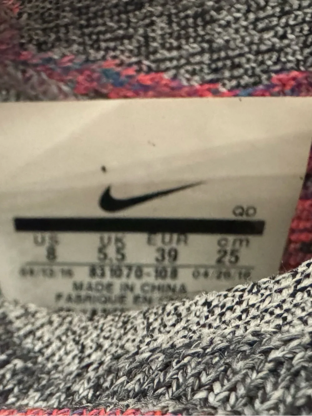 Nike Women’s Gray Knit Running Shoes with Pink and Green Accents